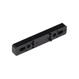 An elongated black plastic shim featuring several mounting holes and small alignment pins, used as a spacer for industrial equipment.