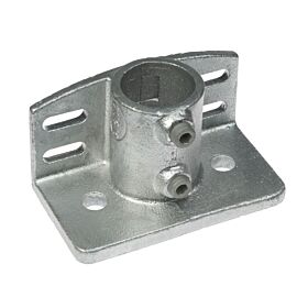 A galvanized cast iron base plate featuring a 1.5-inch pipe sleeve and integrated kick edge for secure floor mounting.