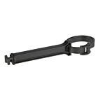 A black plastic clamping strip clip featuring a circular loop and a long rectangular body for industrial fastening applications.