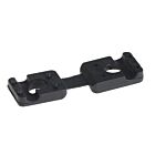 A black plastic clamping pin with two rectangular sections and central holes, designed for industrial mounting on a white background.