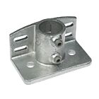 A galvanized cast iron base plate featuring a 1.5-inch pipe sleeve and integrated kick edge for secure floor mounting.
