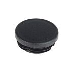 A close-up of a black round plastic end cap with a textured surface and ribbed base for secure pipe installation.